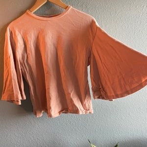 Pink tee with flutter sleeves